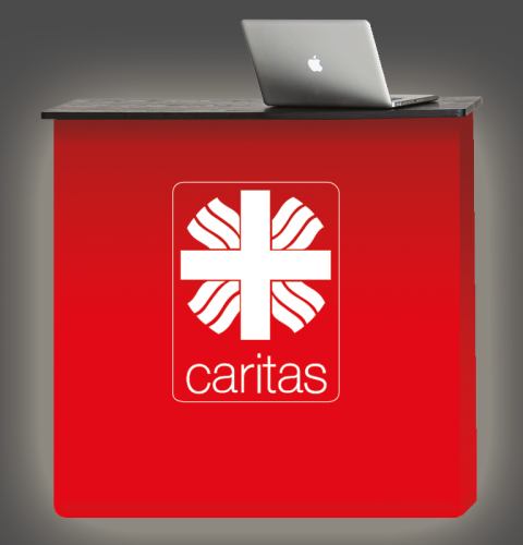 Rote Werbetheke mit Caritas Logo